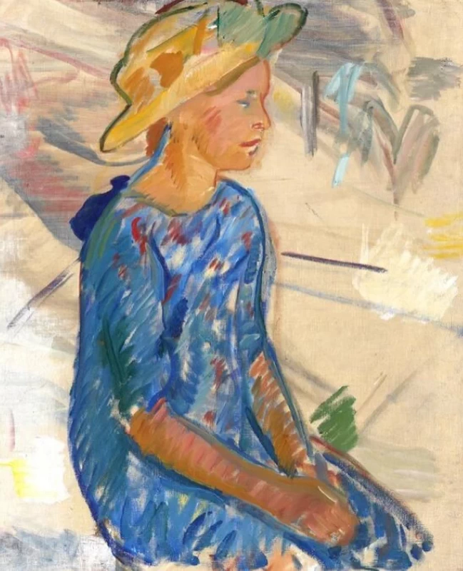 Ragazza seduta con cappello